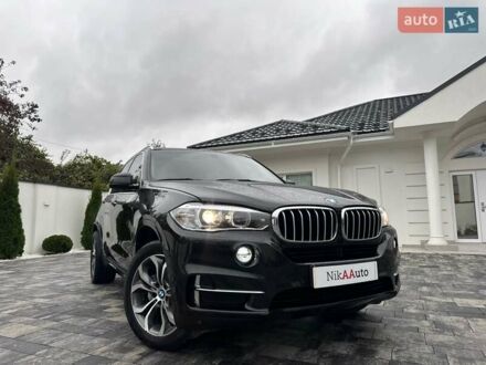 Черный БМВ Х5, объемом двигателя 3 л и пробегом 83 тыс. км за 23800 $, фото 1 на Automoto.ua