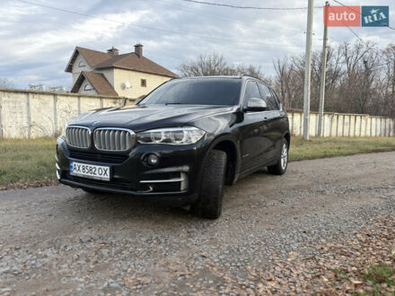 Черный БМВ Х5, объемом двигателя 2 л и пробегом 132 тыс. км за 24900 $, фото 1 на Automoto.ua