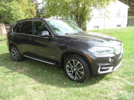 Черный БМВ Х5, объемом двигателя 3 л и пробегом 73 тыс. км за 12000 $, фото 1 на Automoto.ua
