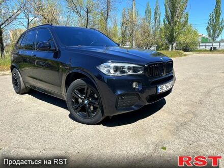 Чорний БМВ Х5, об'ємом двигуна 2 л та пробігом 136 тис. км за 28600 $, фото 1 на Automoto.ua