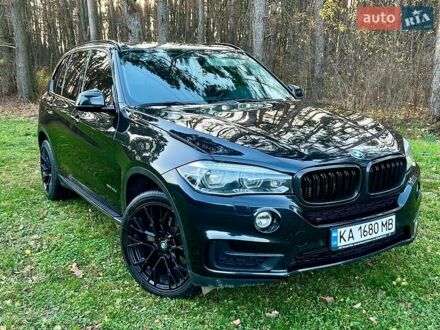 Черный БМВ Х5, объемом двигателя 2 л и пробегом 275 тыс. км за 23000 $, фото 1 на Automoto.ua
