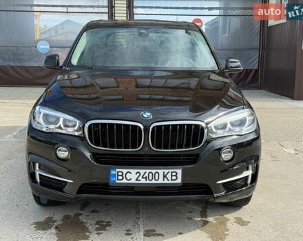 Черный БМВ Х5, объемом двигателя 2 л и пробегом 218 тыс. км за 21999 $, фото 1 на Automoto.ua