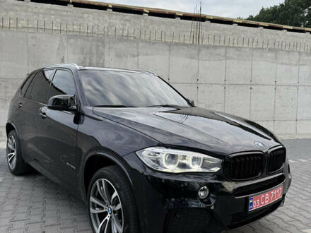 Черный БМВ Х5, объемом двигателя 3 л и пробегом 215 тыс. км за 26500 $, фото 1 на Automoto.ua