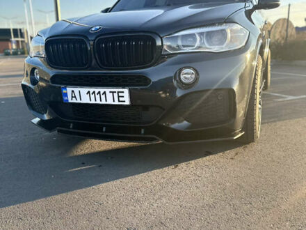 Черный БМВ Х5, объемом двигателя 3 л и пробегом 178 тыс. км за 34500 $, фото 1 на Automoto.ua