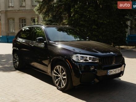 Чорний БМВ Х5, об'ємом двигуна 3 л та пробігом 142 тис. км за 33990 $, фото 1 на Automoto.ua