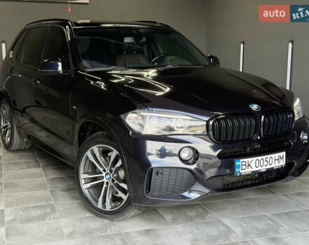Чорний БМВ Х5, об'ємом двигуна 3 л та пробігом 218 тис. км за 33999 $, фото 1 на Automoto.ua