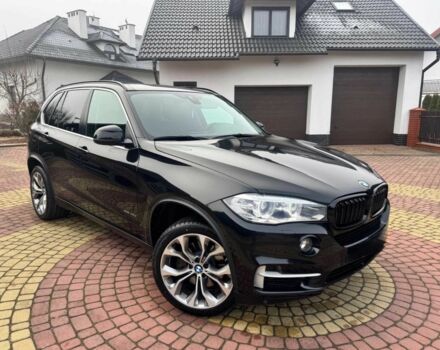 Черный БМВ Х5, объемом двигателя 3 л и пробегом 75 тыс. км за 16500 $, фото 1 на Automoto.ua
