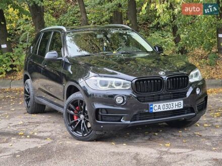 Черный БМВ Х5, объемом двигателя 2 л и пробегом 204 тыс. км за 29900 $, фото 1 на Automoto.ua