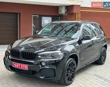 Черный БМВ Х5, объемом двигателя 3 л и пробегом 234 тыс. км за 33300 $, фото 1 на Automoto.ua