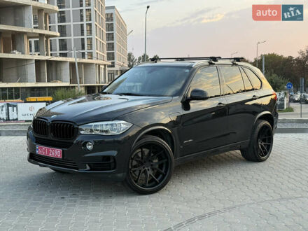 Черный БМВ Х5, объемом двигателя 2 л и пробегом 180 тыс. км за 26900 $, фото 1 на Automoto.ua