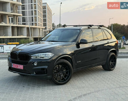 Черный БМВ Х5, объемом двигателя 2 л и пробегом 180 тыс. км за 26900 $, фото 1 на Automoto.ua