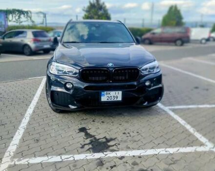 Черный БМВ Х5, объемом двигателя 2 л и пробегом 138 тыс. км за 31500 $, фото 1 на Automoto.ua