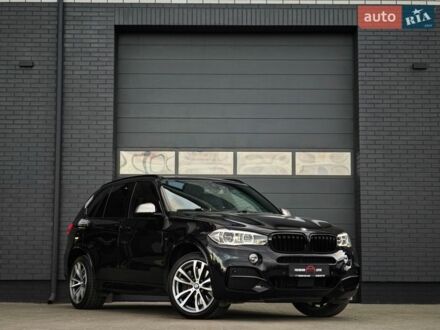 Черный БМВ Х5, объемом двигателя 3 л и пробегом 164 тыс. км за 42499 $, фото 1 на Automoto.ua