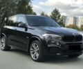 Чорний БМВ Х5, об'ємом двигуна 3 л та пробігом 93 тис. км за 58500 $, фото 1 на Automoto.ua