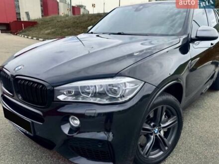 Черный БМВ Х5, объемом двигателя 3 л и пробегом 240 тыс. км за 32800 $, фото 1 на Automoto.ua