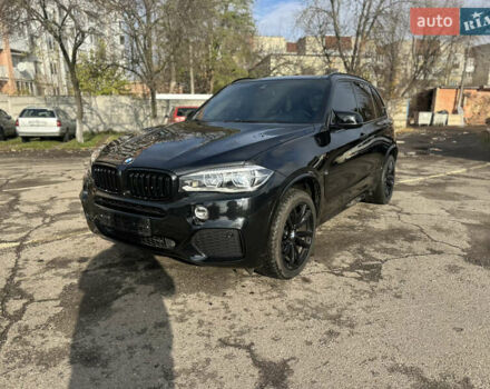 Черный БМВ Х5, объемом двигателя 3 л и пробегом 99 тыс. км за 24900 $, фото 1 на Automoto.ua