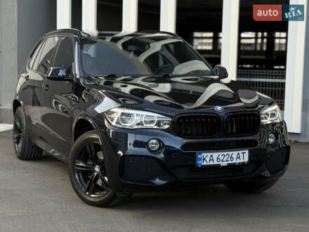 Черный БМВ Х5, объемом двигателя 3 л и пробегом 127 тыс. км за 36500 $, фото 1 на Automoto.ua