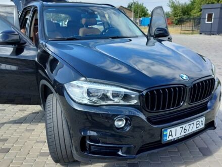 Чорний БМВ Х5, об'ємом двигуна 2 л та пробігом 71 тис. км за 36000 $, фото 1 на Automoto.ua