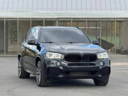Чорний БМВ Х5, об'ємом двигуна 3 л та пробігом 71 тис. км за 15000 $, фото 1 на Automoto.ua
