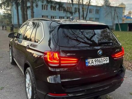 Черный БМВ Х5, объемом двигателя 2 л и пробегом 220 тыс. км за 24900 $, фото 1 на Automoto.ua