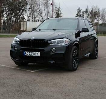 Чорний БМВ Х5, об'ємом двигуна 2 л та пробігом 200 тис. км за 26500 $, фото 1 на Automoto.ua