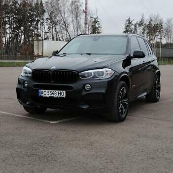 Чорний БМВ Х5, об'ємом двигуна 2 л та пробігом 200 тис. км за 26500 $, фото 1 на Automoto.ua