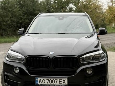 Чорний БМВ Х5, об'ємом двигуна 3 л та пробігом 300 тис. км за 23471 $, фото 1 на Automoto.ua