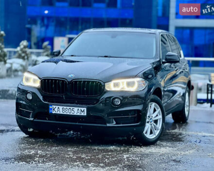 Черный БМВ Х5, объемом двигателя 2 л и пробегом 138 тыс. км за 25800 $, фото 1 на Automoto.ua