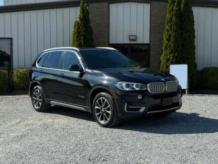 Черный БМВ Х5, объемом двигателя 3 л и пробегом 56 тыс. км за 22000 $, фото 1 на Automoto.ua
