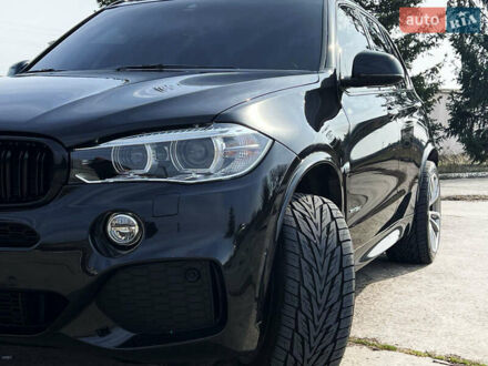 Чорний БМВ Х5, об'ємом двигуна 3 л та пробігом 73 тис. км за 40000 $, фото 1 на Automoto.ua