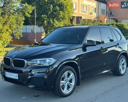 Черный БМВ Х5, объемом двигателя 2 л и пробегом 95 тыс. км за 32500 $, фото 1 на Automoto.ua