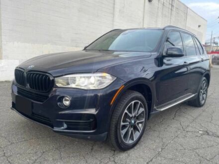 Чорний БМВ Х5, об'ємом двигуна 3 л та пробігом 58 тис. км за 21600 $, фото 1 на Automoto.ua