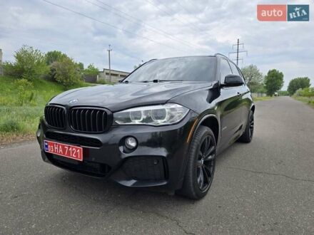 Черный БМВ Х5, объемом двигателя 3 л и пробегом 174 тыс. км за 35500 $, фото 1 на Automoto.ua
