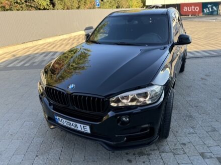 Чорний БМВ Х5, об'ємом двигуна 2 л та пробігом 93 тис. км за 34000 $, фото 1 на Automoto.ua