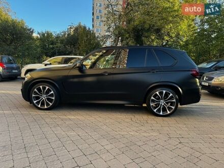Черный БМВ Х5, объемом двигателя 3 л и пробегом 167 тыс. км за 33000 $, фото 1 на Automoto.ua