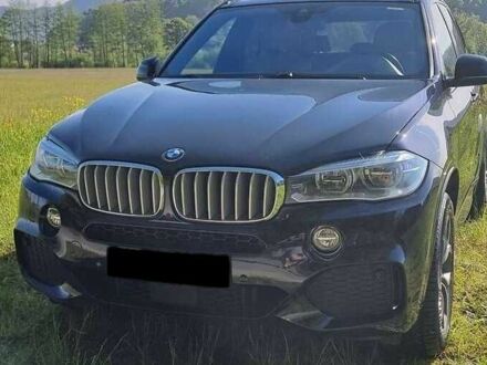 Черный БМВ Х5, объемом двигателя 3 л и пробегом 117 тыс. км за 25000 $, фото 1 на Automoto.ua