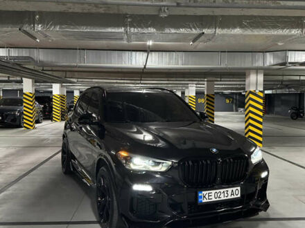 Черный БМВ Х5, объемом двигателя 3 л и пробегом 92 тыс. км за 56900 $, фото 1 на Automoto.ua