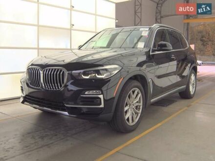 Чорний БМВ Х5, об'ємом двигуна 3 л та пробігом 143 тис. км за 29400 $, фото 1 на Automoto.ua