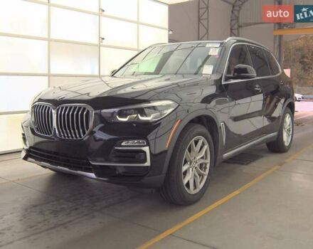 Черный БМВ Х5, объемом двигателя 3 л и пробегом 143 тыс. км за 29400 $, фото 1 на Automoto.ua