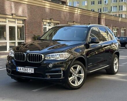 Черный БМВ Х5, объемом двигателя 2 л и пробегом 143 тыс. км за 34500 $, фото 1 на Automoto.ua