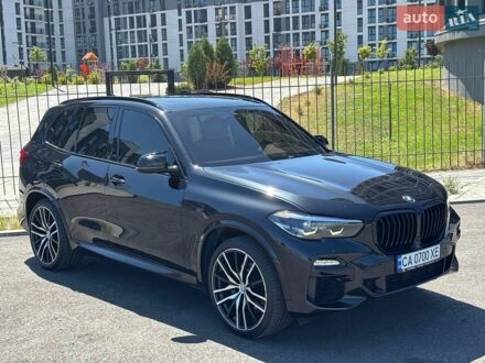 Черный БМВ Х5, объемом двигателя 3 л и пробегом 175 тыс. км за 44900 $, фото 1 на Automoto.ua