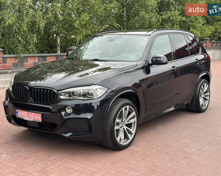 Черный БМВ Х5, объемом двигателя 3 л и пробегом 275 тыс. км за 35900 $, фото 1 на Automoto.ua