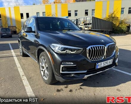 Черный БМВ Х5, объемом двигателя 3 л и пробегом 54 тыс. км за 51500 $, фото 1 на Automoto.ua