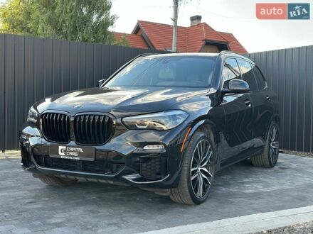 Чорний БМВ Х5, об'ємом двигуна 3 л та пробігом 174 тис. км за 41500 $, фото 1 на Automoto.ua