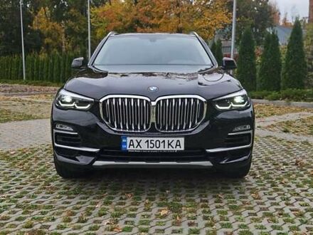 Черный БМВ Х5, объемом двигателя 2 л и пробегом 74 тыс. км за 53000 $, фото 1 на Automoto.ua