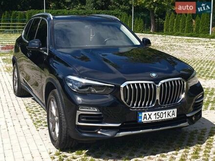 Черный БМВ Х5, объемом двигателя 2 л и пробегом 73 тыс. км за 53800 $, фото 1 на Automoto.ua