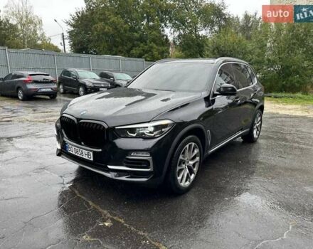 Черный БМВ Х5, объемом двигателя 3 л и пробегом 74 тыс. км за 57500 $, фото 1 на Automoto.ua