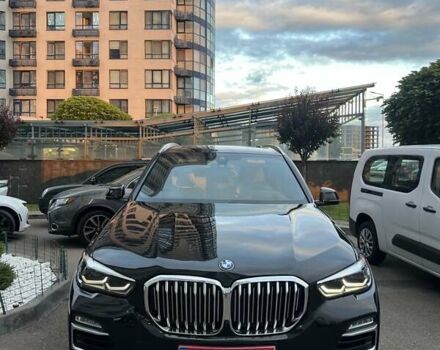 Чорний БМВ Х5, об'ємом двигуна 3 л та пробігом 104 тис. км за 43500 $, фото 1 на Automoto.ua