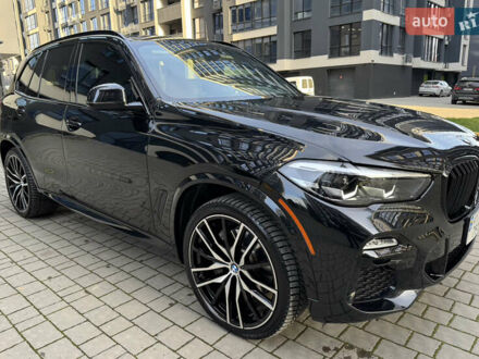 Черный БМВ Х5, объемом двигателя 3 л и пробегом 60 тыс. км за 61900 $, фото 1 на Automoto.ua