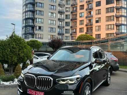 Черный БМВ Х5, объемом двигателя 3 л и пробегом 105 тыс. км за 41000 $, фото 1 на Automoto.ua